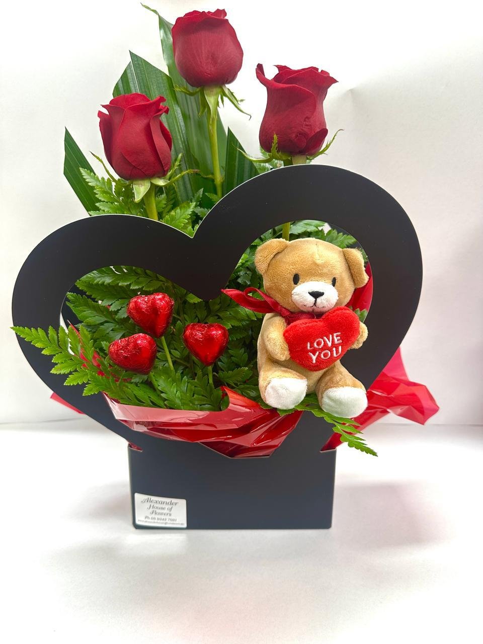 A Heart Rose Arrangement with Chocolates and Bear